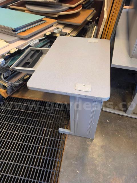 ONE SMALL GREY DESK