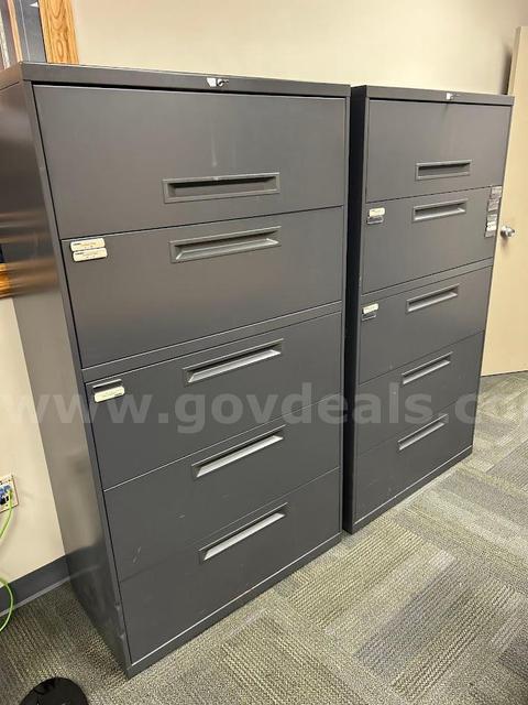 lot of two wide grey file cabinets