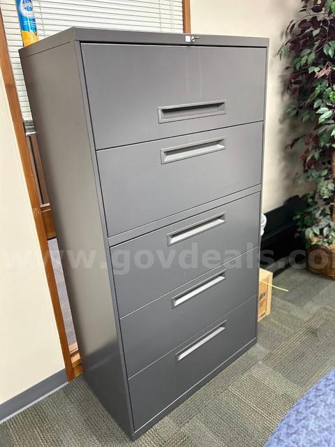 one wide grey file cabinet