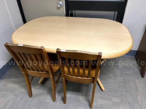 Table and two wooden chairs