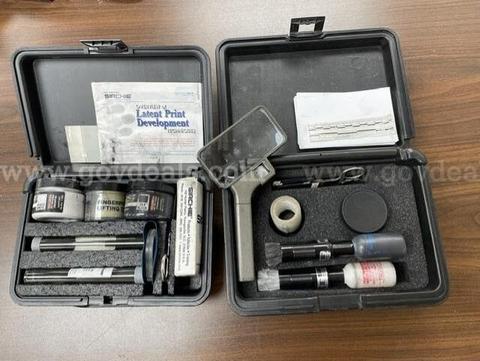 (2) used Sirchie fingerprint / latent print technician kits.