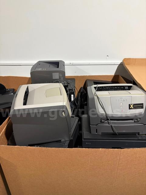 Approximately 10-15 assorted used printers