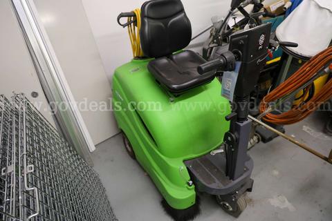 Compact Battery Powered Ride-On Vacuum Sweeper