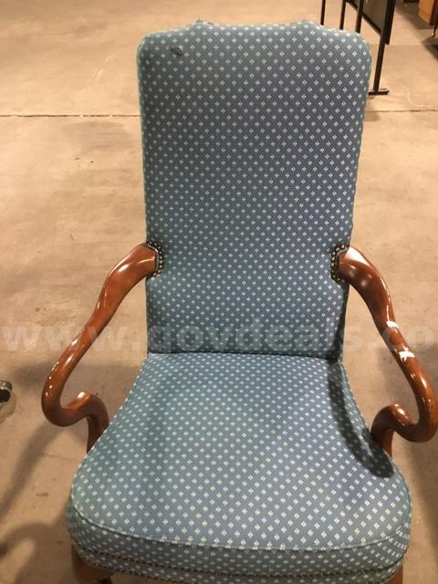 Blue executive chair; with dark brown wood armrests "DH"