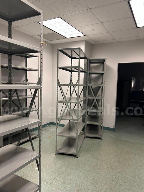 One lot of (20) storage shelves metal