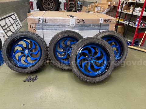 Set of four 24" Forgiato Terra Rims with 35x12.50 Mud tires with lugs and key