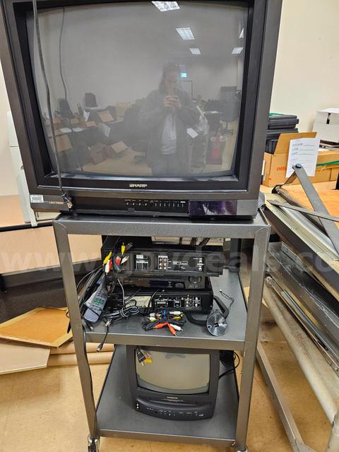 Tvs, DVD and VHS players, cords and remotes w/ Rolling Carts