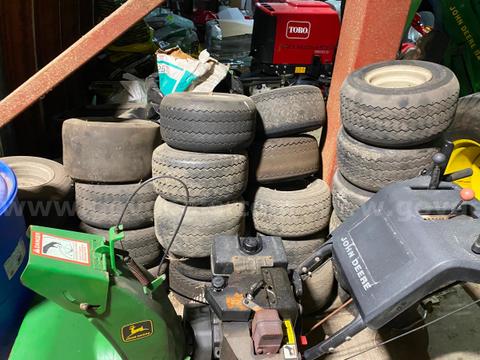A Lot of Golf Cart Tires and Hub Caps