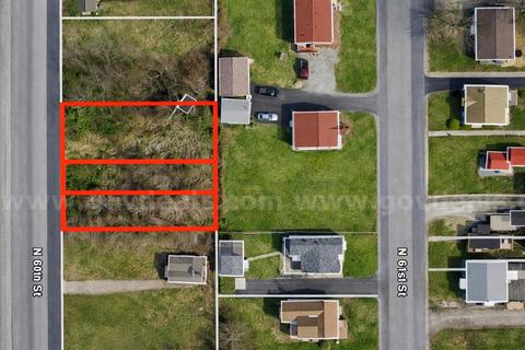 (100 X 132 Sq ft) (0.30 Acres) Large 3-adjacent City Lots about 7.6 Miles from Downtown St. Louis