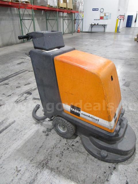 Taski Floor Scrubber (B) - government surplus lot currently bid at $1 in Indianapolis, IN