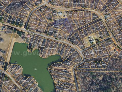 2 vacant lots in Saulsbury, TN across the street from Hickory Lake-almost 1 acre!
