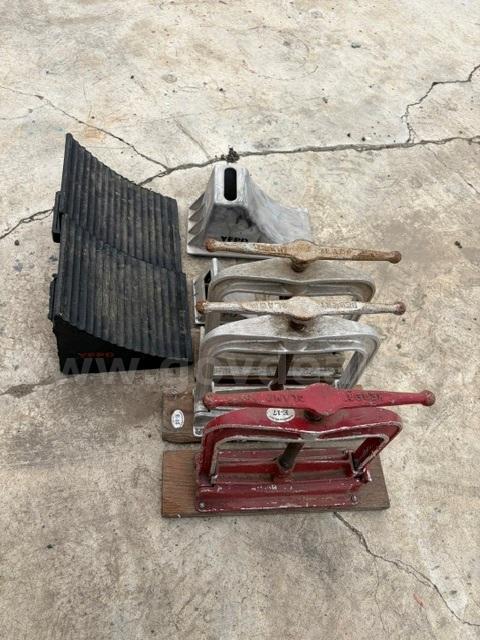 Lot of Wheel Chocks and Hose Clamps