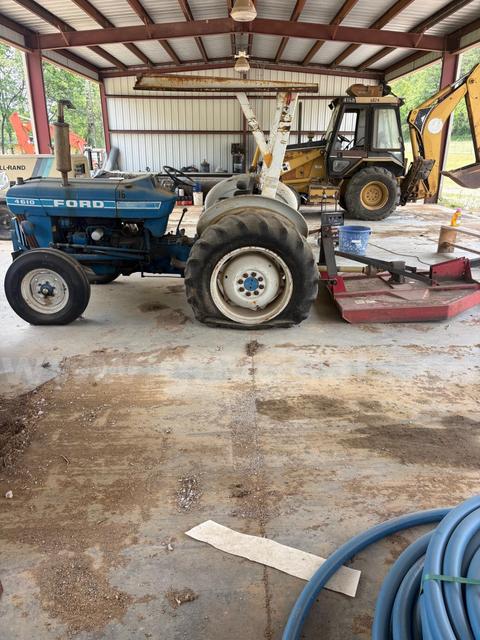 Blue Ford 4610 Tractor with bush hog
