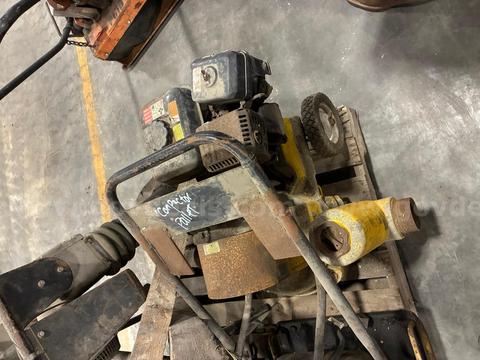 Pallet of small engine construction equipment, compactor, generator, wacker jumping jack, pump