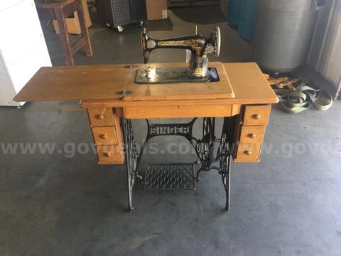 ANTIQUE SEWING TABLE AND SEWING MACHINE