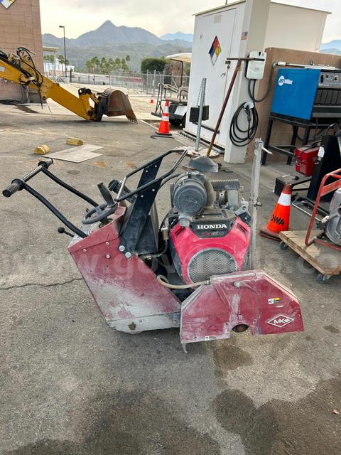 Used MK self propelled walk behind saw