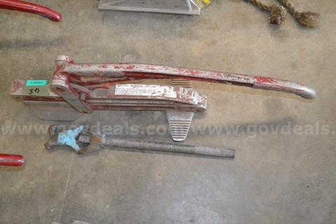 Lot to include lever style hose clamp, hydrant wrench