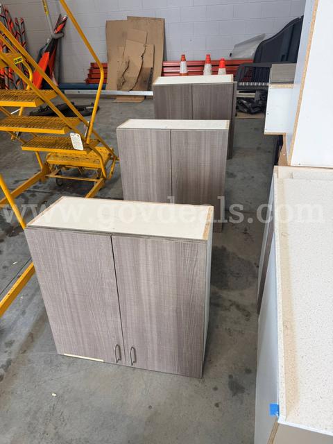 Cabinets with table top plus overhead cabinets and Misc office desk pieces