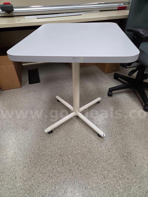 Three Grey Tables