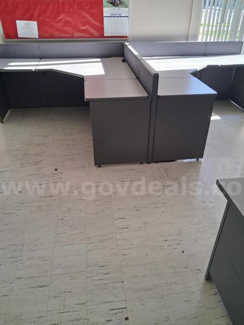 Set of three office desks.