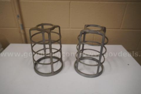 Pair of industrial light cages