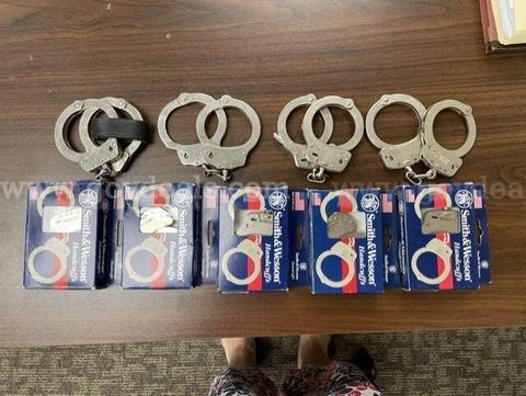 Lot of 9 Handcuffs - 5 New Smith & Wesson / 4 Used Various Brands