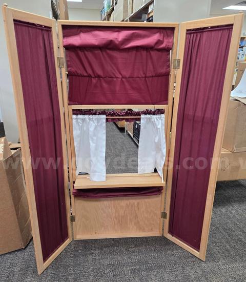 drop down projector screen , shelving, puppet theater