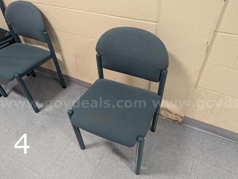 4 blue fabric stackable guest chairs
