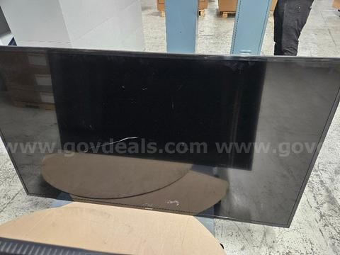 Two Samsung 65-inch commercial displays, Model LH65MDCPLGA/ZA, offered AS-IS.