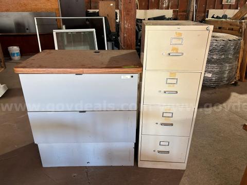 one 4 drawer metal file cabinet, one 2 drawer wood file cabinet  lot 25