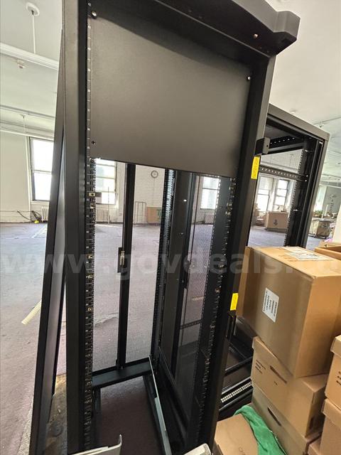 Freestanding enclosed server/network equipment rack cabinet