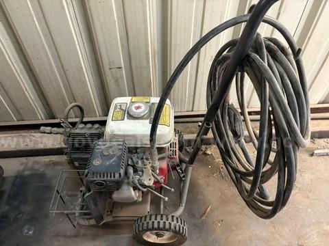 Pressure washer commercial-grade equipped with a Honda GX-series engine mounted