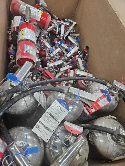 Fire Extinguishers various sizes and colors for auction. Sold As Is. Total 75.