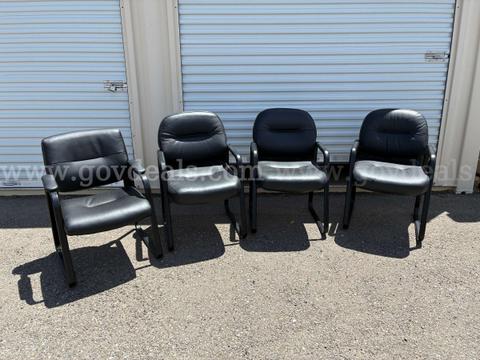 4ea. CUSHIONED BLACK STATIONARY CHAIRS