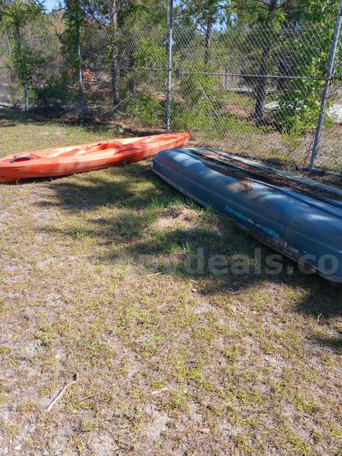 1 Kayak and 1 Small Green Boat