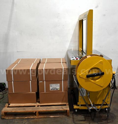 StraPack RQ8000 Automatic Strapping Machine With (12) Boxes Of Strapping Band