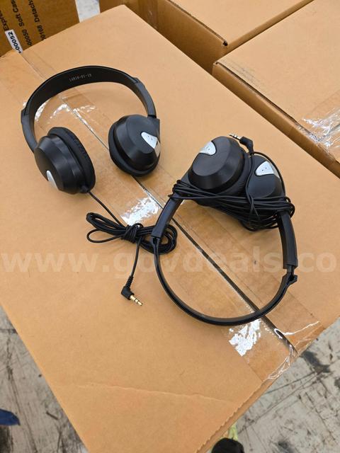 13 boxes of headphones, unknown specific quantity but probably around 2000 total headphones