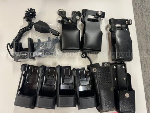 9 Motorola Radio Holsters & 1 Radio Charger