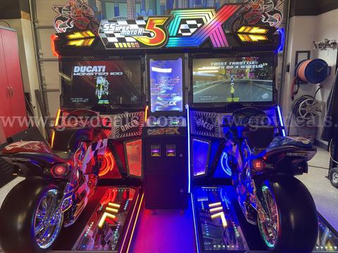 Super Motor 5 DX / Moto 5DX style dual‑motorcycle racing simulator