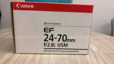 Canon EF 24-70mm f/2.8L USM (NEW IN BOX) valued at approximately $2,000