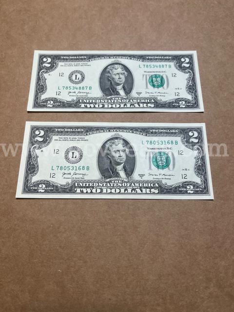 Two $2 Federal Reserve Notes