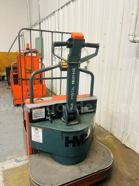 Toyota Riding Pallet Jack, Toyota Tow Motor, and Charging Station