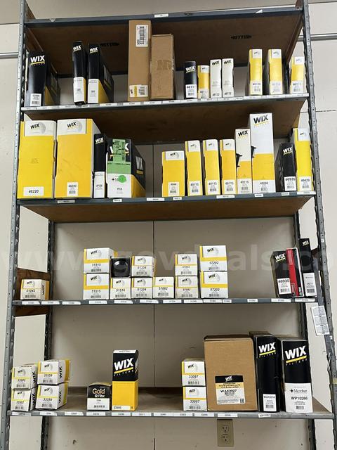 Assorted Air Filters, Oil Filters, and Fuel Filters