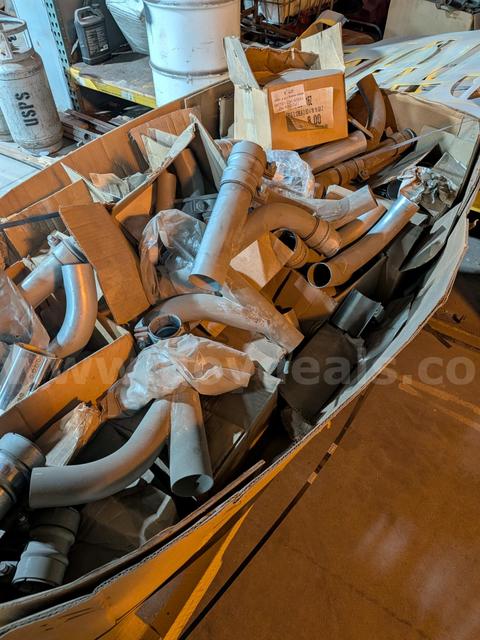 Box of Connectors, clamps and straight Pipes