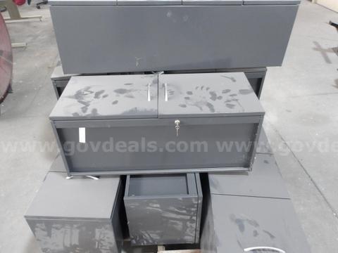 3 pallets of overhead cabinets
