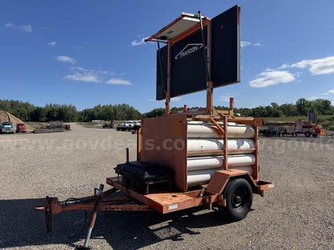 Arrow board storage trailer with signs