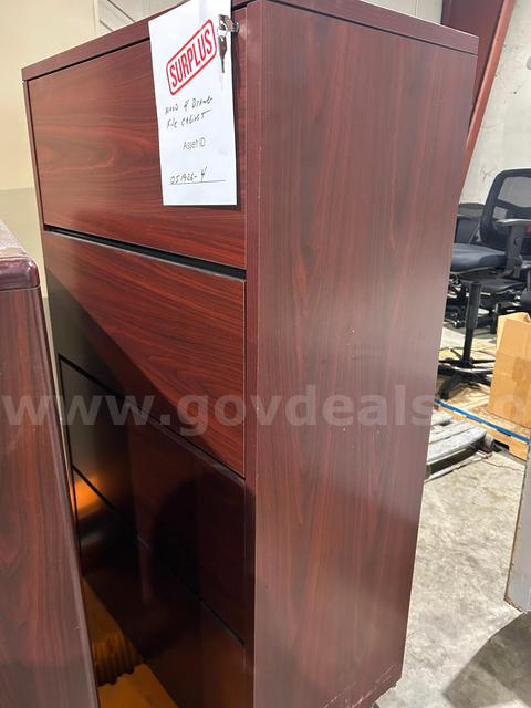 One (1) Wooden File Cabinet - Four Drawers
