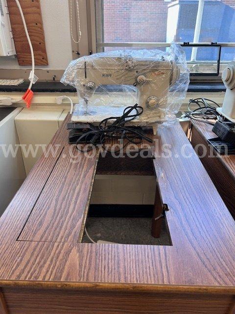 Sewing machine and cabinet