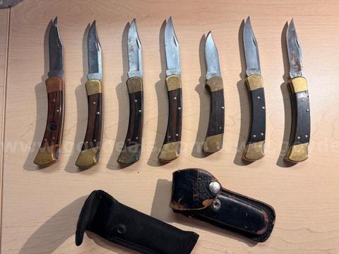 lot of seven wooden Buck knives