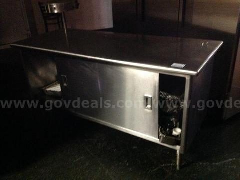 6ft Stainless steel food table with ticket spindle and bottom storage
